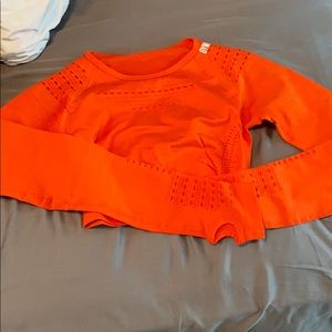 Beautiful orange long sleeve gym shark crop top!